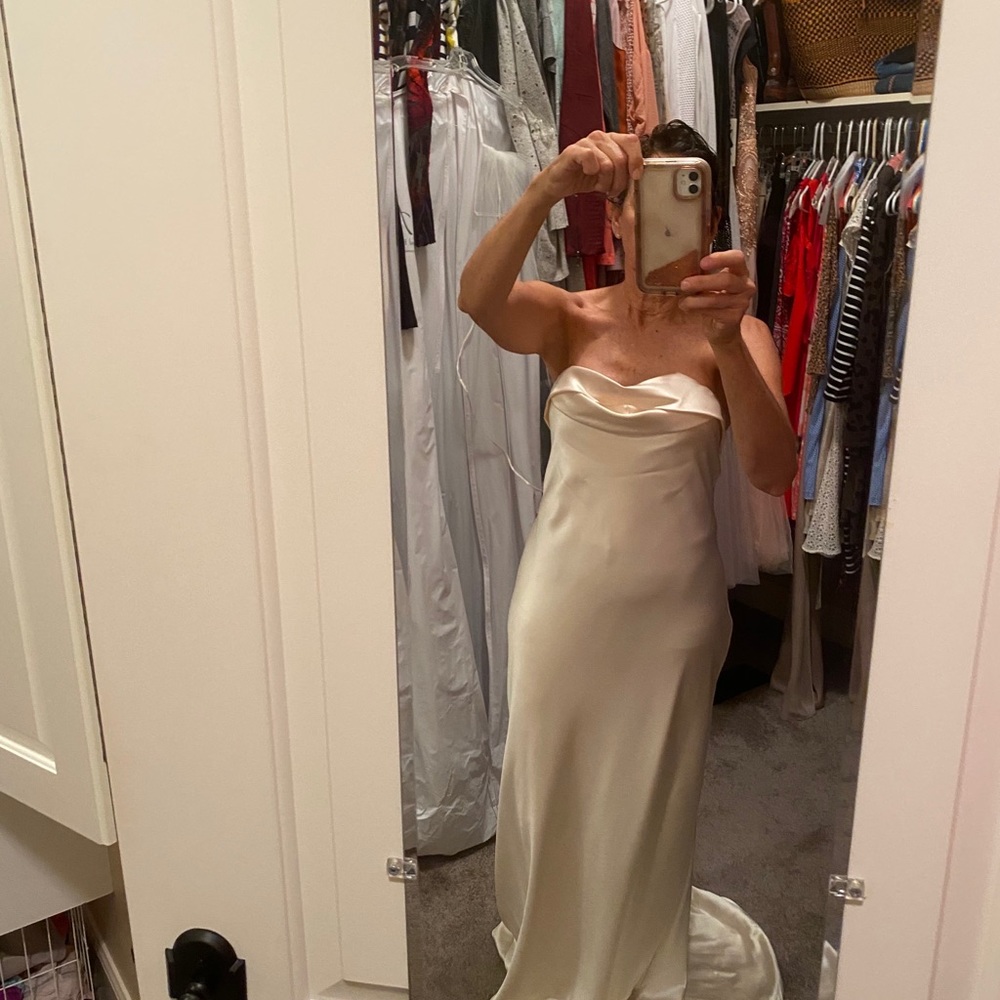 Beautiful Ivory high low hem satin gown.